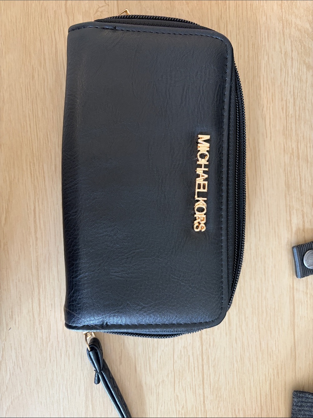 Michael Kors Black Leather Zip-Around Wristlet with Gold Logo